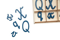 Cursive Letters Q, X, V in Wooden Box